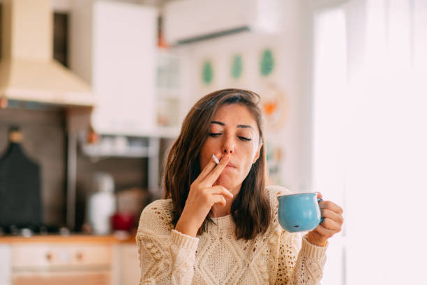 istock Woman Smoking While Studying at Home 1278572459