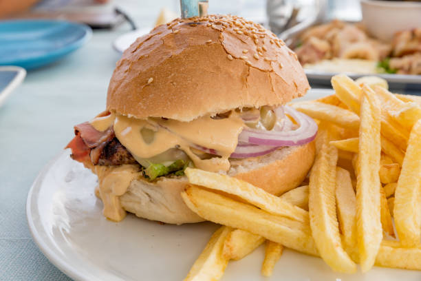 istock Big burger with french fries boundary 1278576616