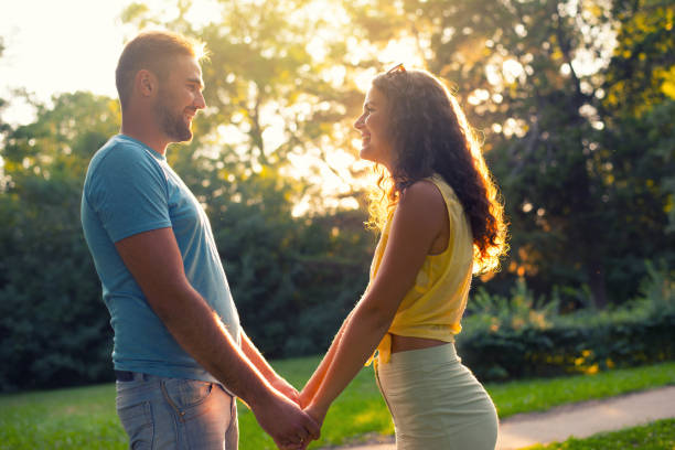 istock Happy couple in the summer park 1278576741