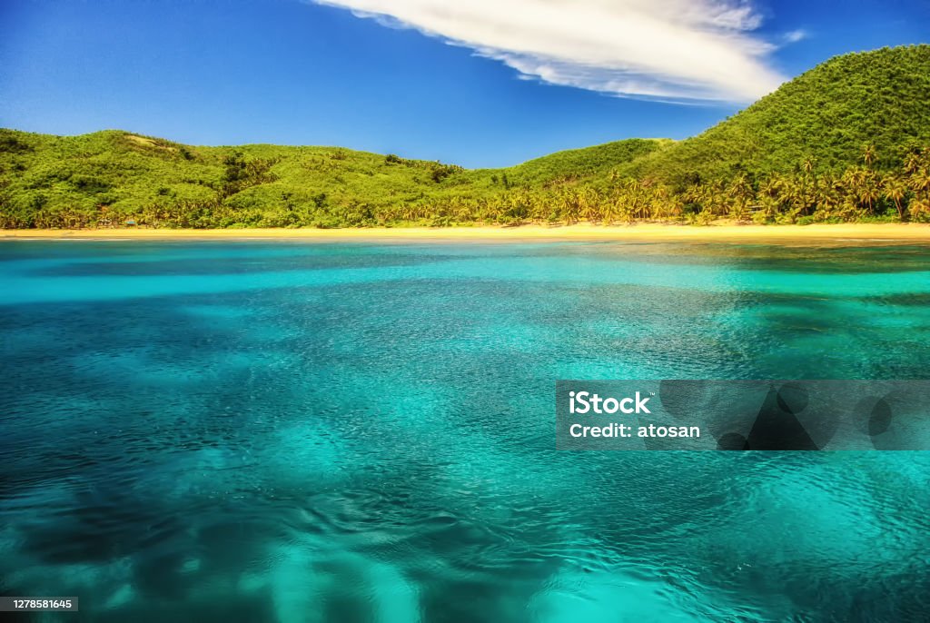Turquoise water Turquoise water,  in the background Waya Island, Yasawa island group, Fiji, South Pacific islands, Pacific Fiji Stock Photo