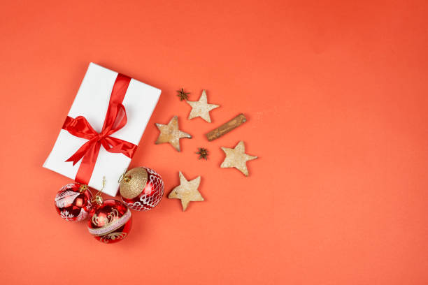istock Xmas present box with Christmas baubles, sweet cookies 1278582674