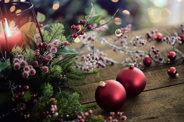 istock Christmas Lantern and Baubles in front of the Christmas Tree 1278583924