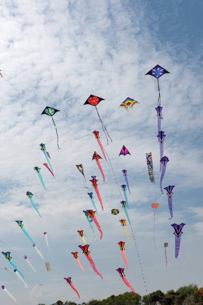 istock Kites with blue sky and white clouds 1278584299