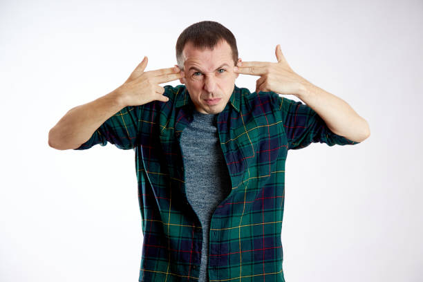 istock Man in anger shouts, domestic violence, irritation, an angry expression on his face 1278585540