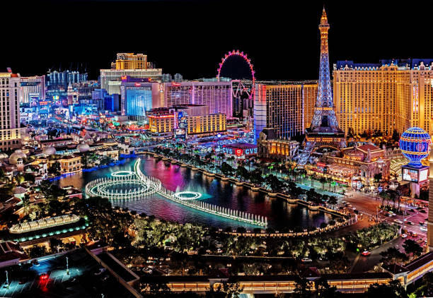Panoramic view of Las Vegas strip at night in Nevada. Las Vegas, USA - February 17, 2019 The famous Las Vegas Strip with the Bellagio Fountain. The Strip is home to the largest hotels and casinos in the world. las vegas stock pictures, royalty-free photos & images