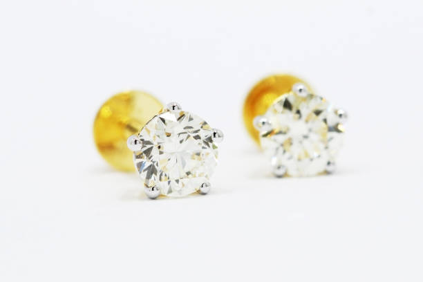 Big Round Solitaire Diamond Earring with One Earring De Focus stock photo