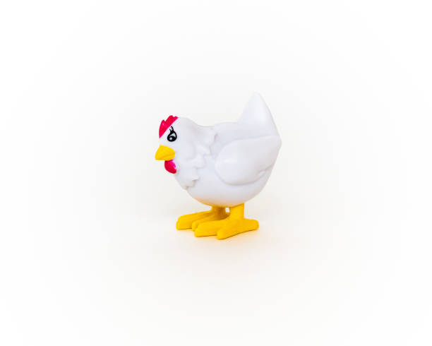 White toy chicken isolated on a white background