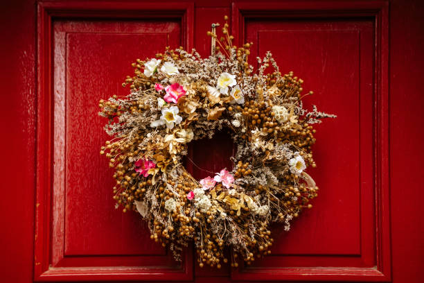 istock Colorful red door with bright wreath, closeup 1278588591
