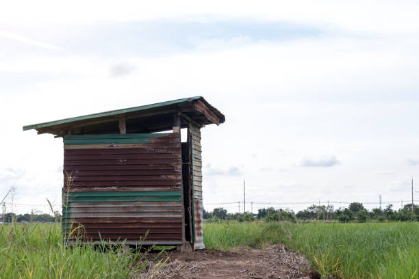 istock Old zinc bathroom on rice paddies. 1278589403