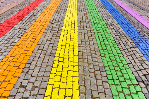Rainbow colored crosswalk installation at pride parade in Helsinki