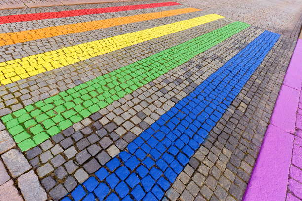 istock rainbow colored crosswalk at pride parade in Helsinki 1278592076