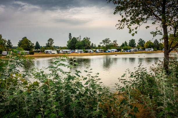 istock camping ground on a quiet lake 1278593322