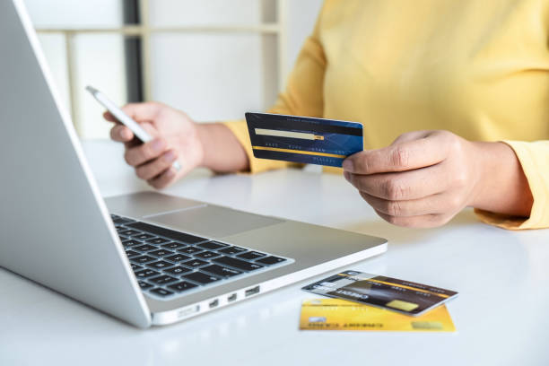 istock Woman using credit card and smartphone register security code payments online shopping and customer service network connection market, using technology on laptop, Internet Online shopping concept 1278594013