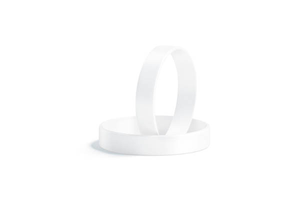 istock Blank white two silicone wristband mockup lying and stand, isolated 1278594339