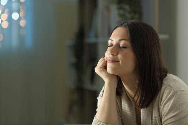 istock Woman relaxing mind at home in the night 1278595355