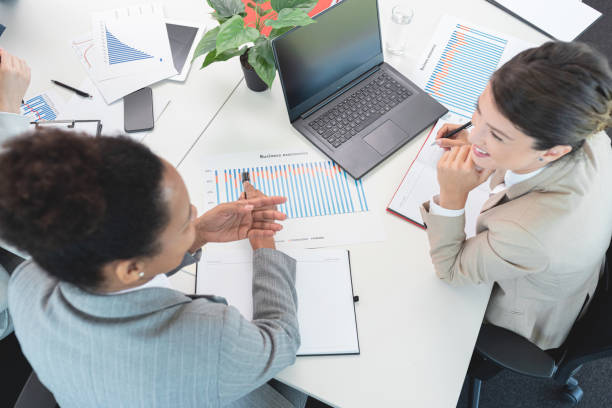 istock Two businesswomen working at office 1278596926