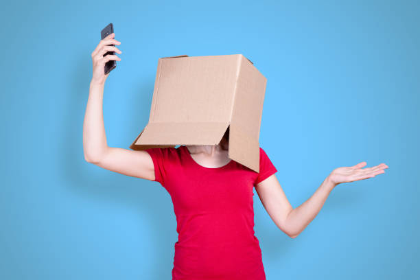 istock Packaging cardboard on the head with different emotions 1278598527