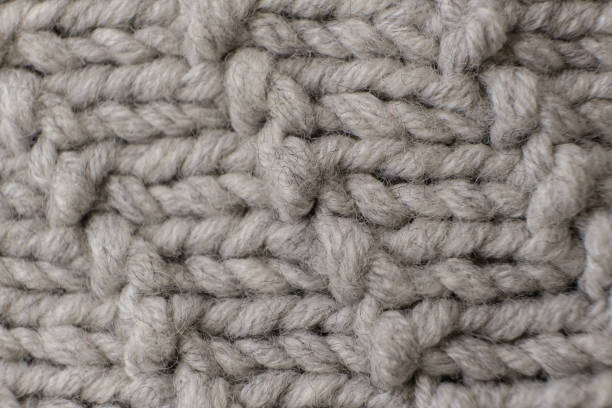 istock Handmade grey knitting wool texture background close up 1278598871