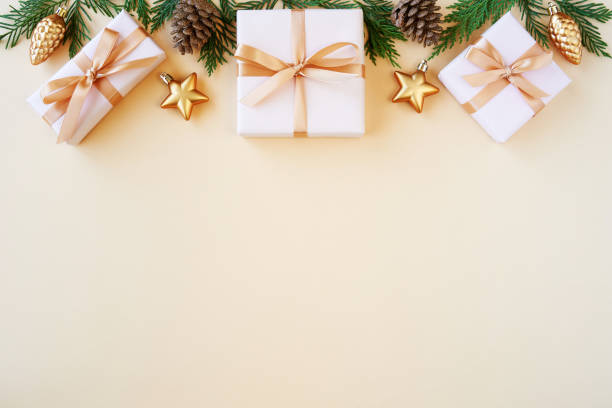 istock Christmas flat lay background with fir tree, present box and decorations. Free space , top view 1278603658