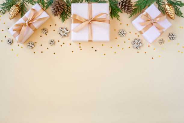 istock Christmas flat lay background with fir tree, present box and decorations. Free space , top view 1278603678