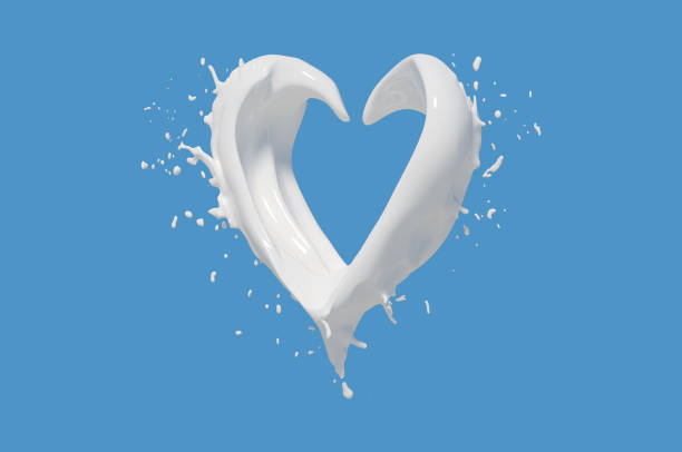 istock milk heart splashes close-up concept 1278604338