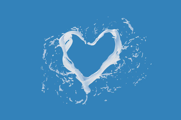 istock milk heart splashes close-up concept 1278604359