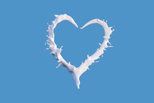 istock milk heart splashes close-up concept 1278604371