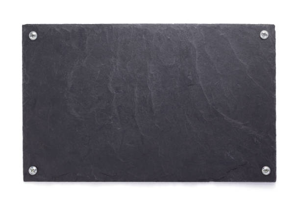 istock black slate stone at wooden background texture 1278605196