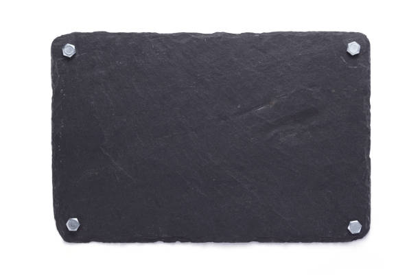 istock black slate stone at wooden background texture 1278605208