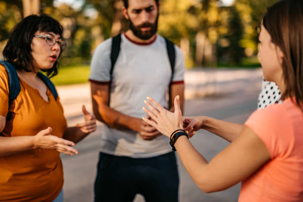 istock Friends speak in sign language 1278606576