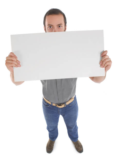 istock Man holding a blank sign 1278606915
