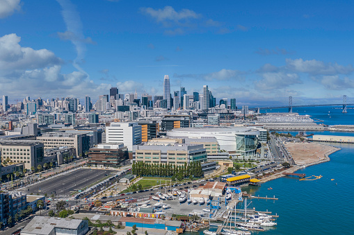 An aerial view of the area of San Francisco known as South Beach and Mission Bay as well as the New development for Mission Rock. The new Chase arena and othe notable building on the skyline.