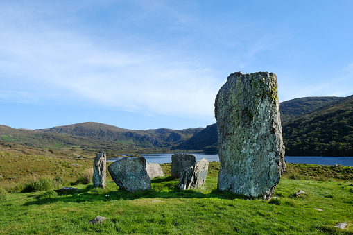 Panoramic view of the ancient Corrimony Chambered Cairn among the green Scottish glen