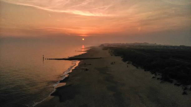 istock Sun setting over Bournemouth Beach on a hazy evening 1278616882