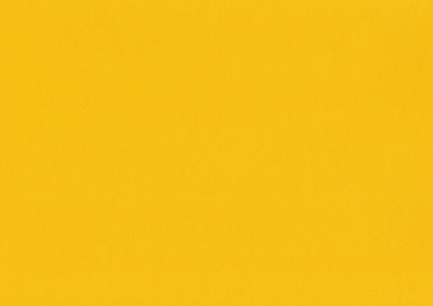 istock Yellow pastel paper texture background, simple template. 1278618912