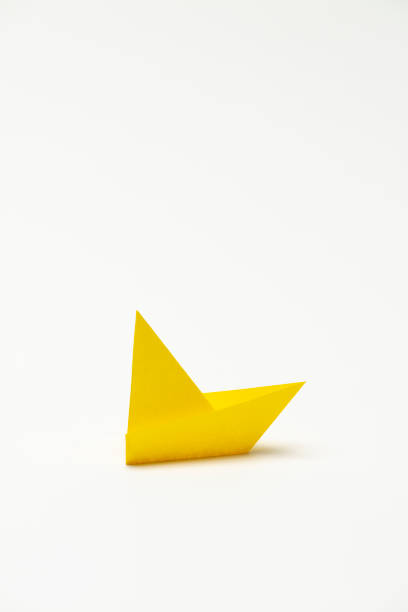 istock Yellow Paper Boat 1278621743