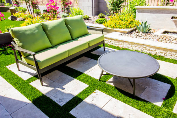 istock Unique Rear Yard Patio With Table & Light Green Furniture 1278623024