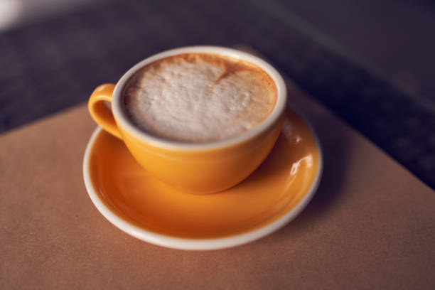 istock Cappuccino in the beautiful yellow ceramic cup. 1278625123