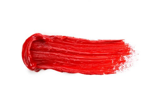 istock Lipstick smear smudge swatch isolated on white background. Cream makeup texture. Bright red color cosmetic product brush stroke swipe sample 1278626210