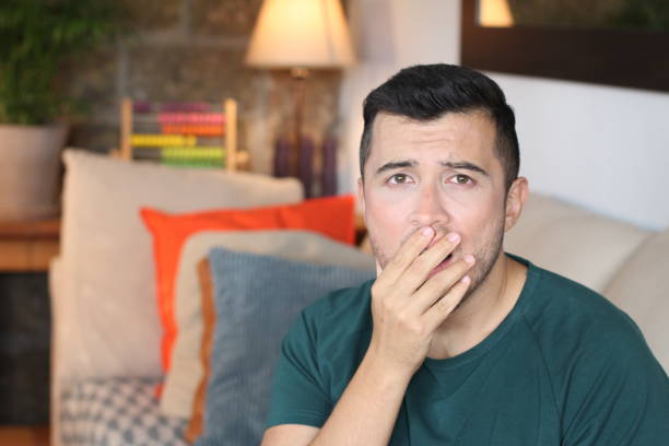 istock Worried man covering mouth with hand 1278626628