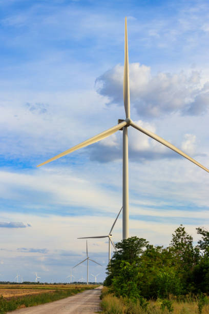 istock Wind turbines in a field. Renewable energy 1278631690