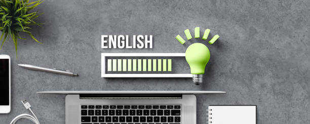 lightbulb and loading bar with the word ENGLISH and office equipment
