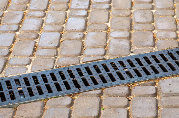 istock storm drainage system on the the pedestrian road 1278632400