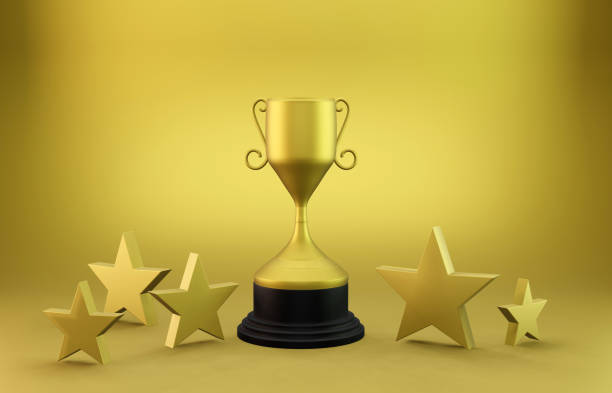 istock Golden Trophy And Stars on Gold Background 1278635006