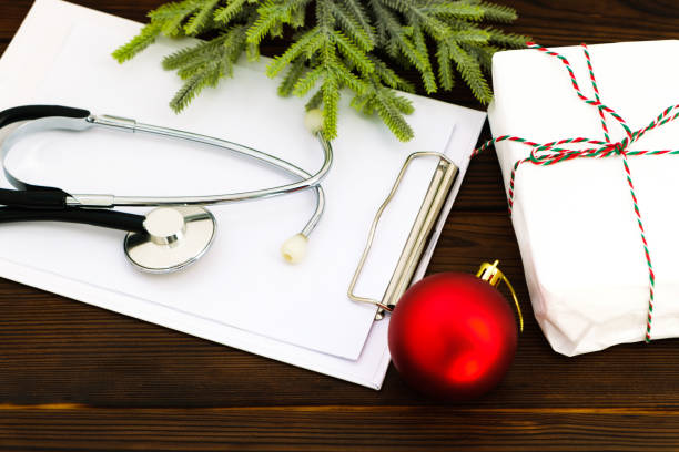 istock stethoscope, blank sheet on clipboard on wooden background 1278636268
