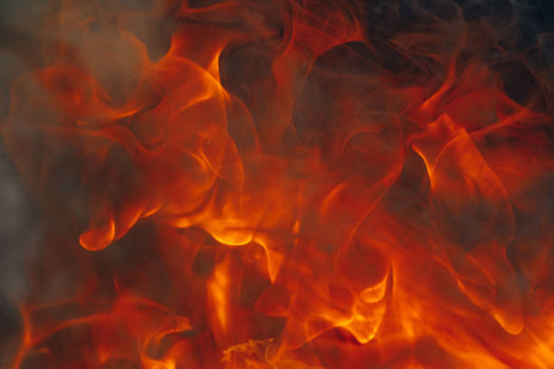 istock blazing fire background with tongues of flame 1278640128