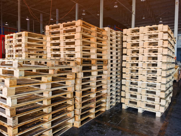 istock Worker driving forklift to loading wooden pallets from truck to warehouse cargo storage, shipment in logistics and transportation industrial, wood pallets stack, delivery service 1278643423