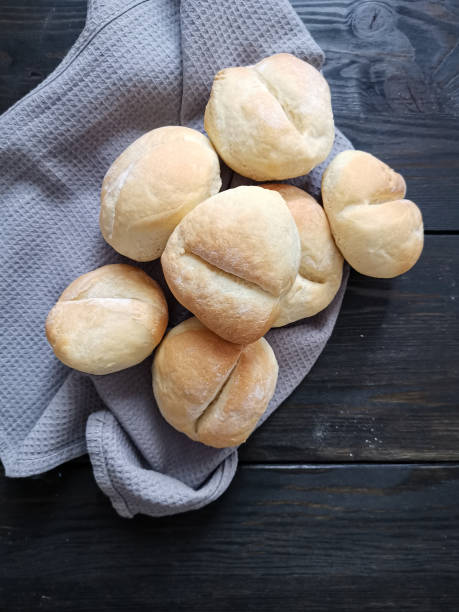 istock Homemade yeast rolls on a black table 1278644561