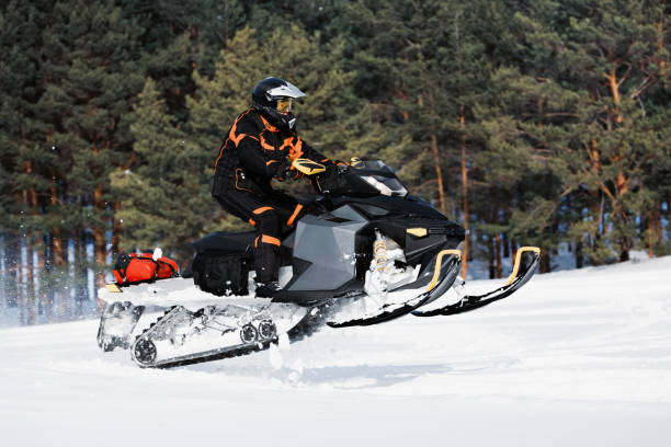 istock In deep powder snowdrift snowmobile rider driving fast. 1278646436