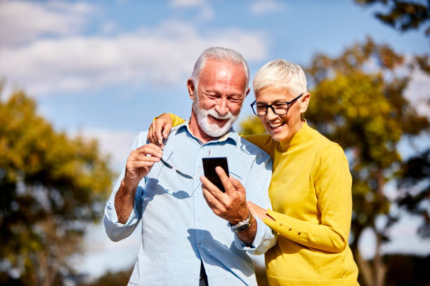 istock senior couple mobile phone happy cellphone 1278647793